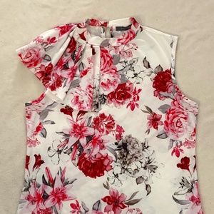 Beautiful flower top with ruffle on shoulder